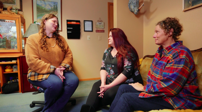All Day $49 Montana Registered Agent staff at office sitting in circle chatting and smiling