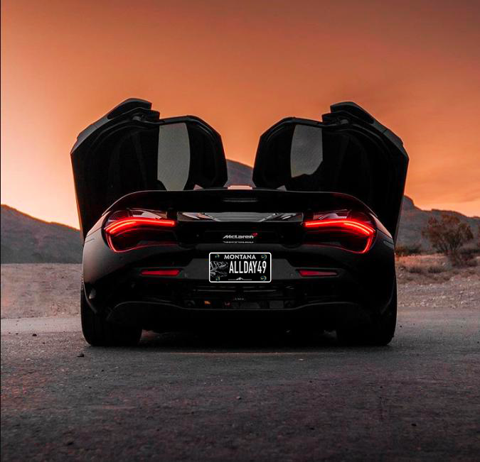 Custom Montana license plate on a luxury McLaren supercar.